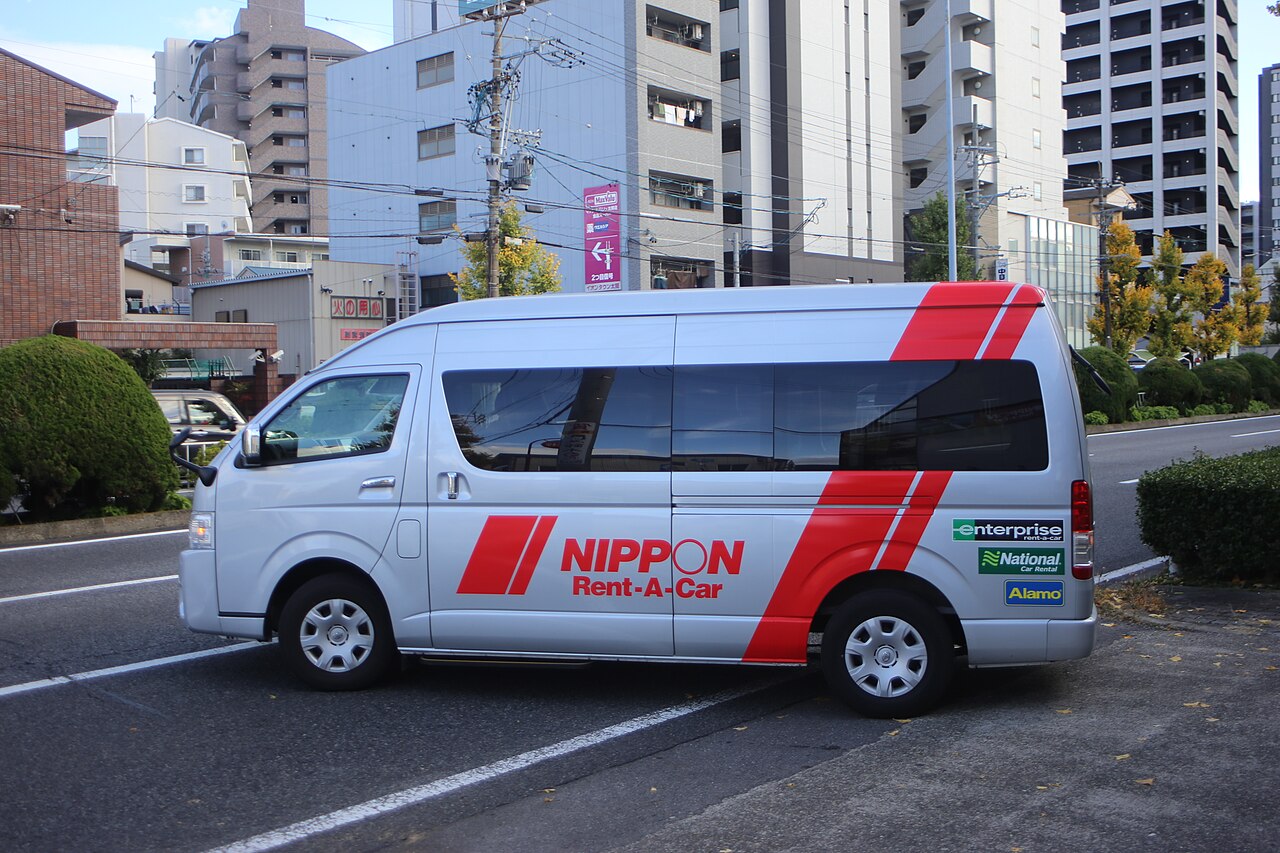 Vehicle bearing Nippon Rent-A-Car branding in Nagoya, photographed in 2022